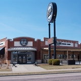 Restaurant exterior with large patio.