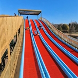Blue and red tubing hill.