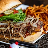 A sandwich and fries.