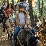 People riding horses in Wisconsin Dells.