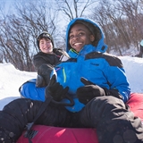 Kids get ready to tube downhill at Cascade Mountain.