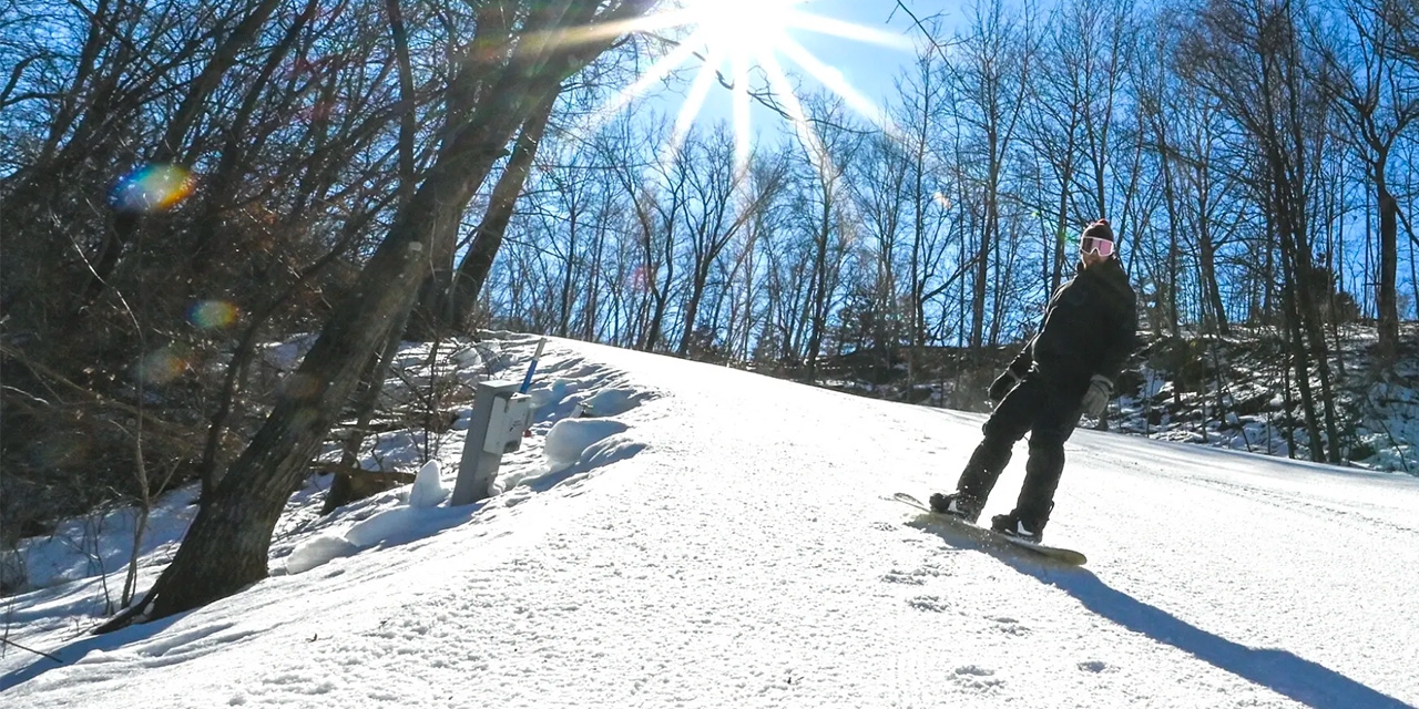 Person snowboarding.
