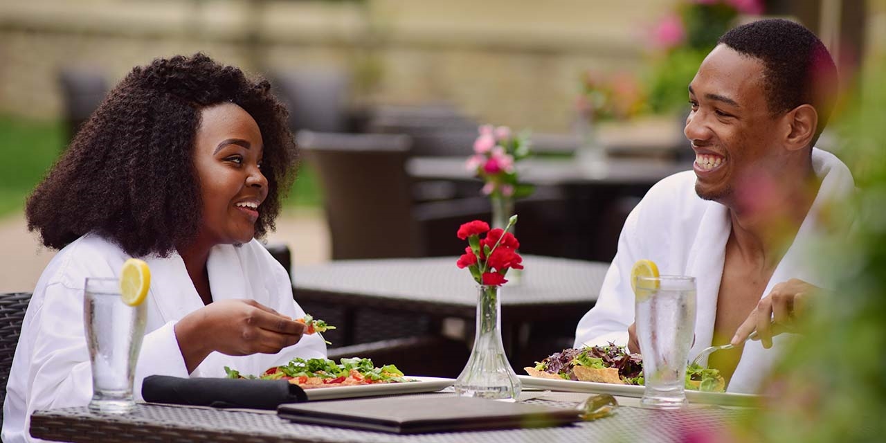 Couple dining at Sundara Inn & Spa