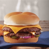 Various Culver's menu items including a cheeseburger and onion rings.