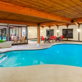 Indoor pool area at Days Inn & Suites.