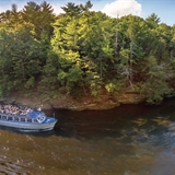 Guests admire the Wisconsin Dells rock features and nature.