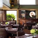 Indoor dining space with a bar.