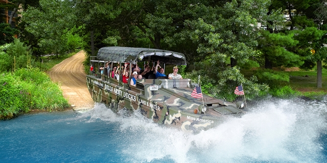 A Dells Army Duck entering water.