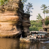 A Dells Army Duck showing visitors the unique rock formations in Wisconsin Dells.