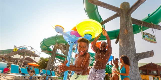 Father and son playing at Wilderness waterpark.
