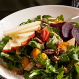 Plated fennel and goat salad.