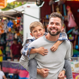 Father and son at Wo-Zha-Wa Fall Festival.