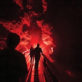 Narrow canyon lit up red.