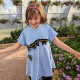 girl with butterflies on shirt
