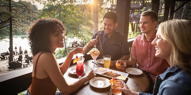 Couples enjoy a sunset meal at Ishnala Supper Club