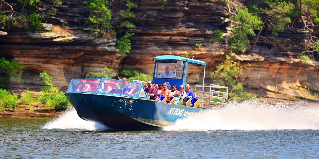 A jet boat zips through the water.