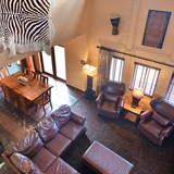 Living and dining area with various decorations.