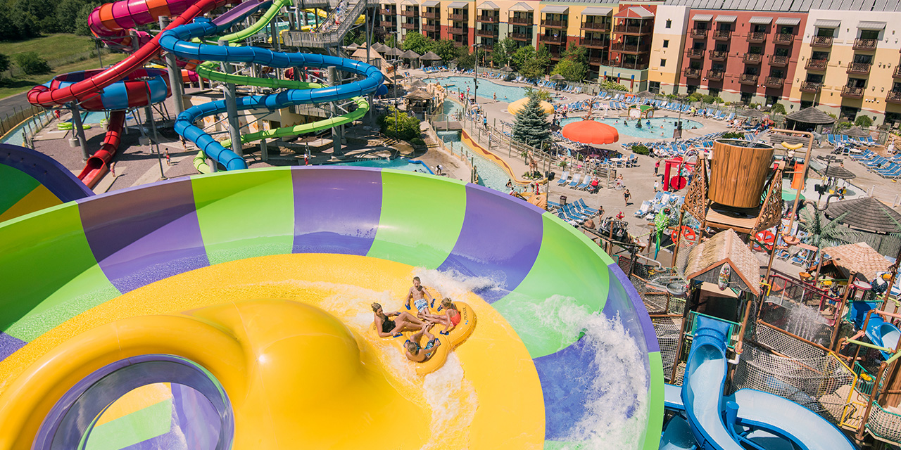 Family at a Kalahari Resort Waterparks' outdoor waterslide.
