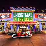 Legacy Dinner Theater's exterior themed with Christmas items.