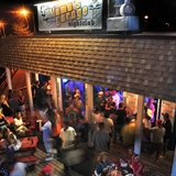 People enjoying the outdoor space at Mama's Garage.
