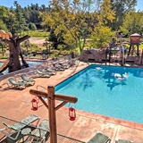 Outdoor pool areas with poolside seating.