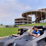 People go-cart at Mt. Olympus Water & Theme Park.