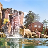 People swimming in the lagoon area.