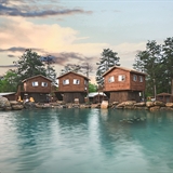 Natura Treescape Resort rooms overlooking the pool area.