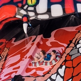 People go down a two-person waterslide.