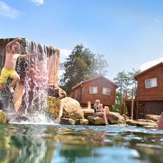 Family swimming at Natura Treescape Resort