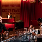 A couple at the bar.