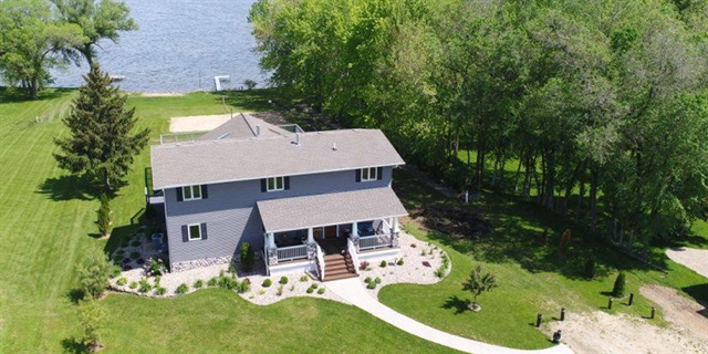 photo of house on body of water