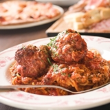 Dish with large meatballs.