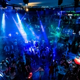 People dance at a show at The Reef.