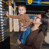 little boy and mom at vertical leap