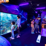 People doing blacklight mini-golf.