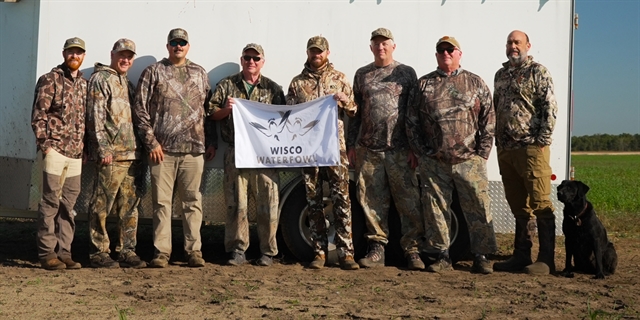 Group of hunters posing.