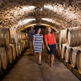 People explore the cellars and barrels within.